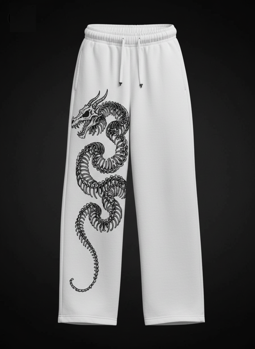 White, wide-leg graphic unisex joggers with a dragon skeleton
